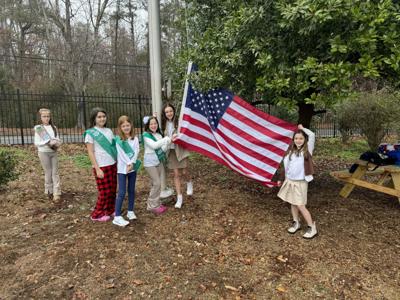 Girl Scouts earn badge in flag-raising ceremony | Sandy Springs News ...