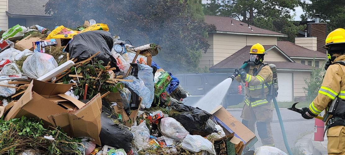 Hot Garbage Benton County firefighters put out flaming trash dumped