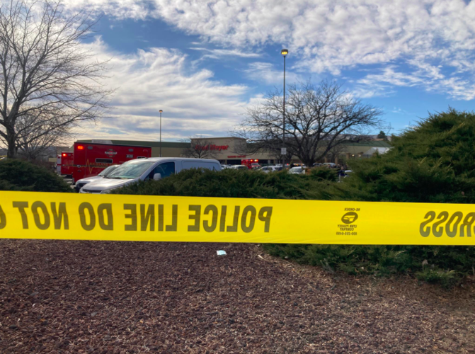 Fred Meyer employee in critical condition, armed suspect at large in ...