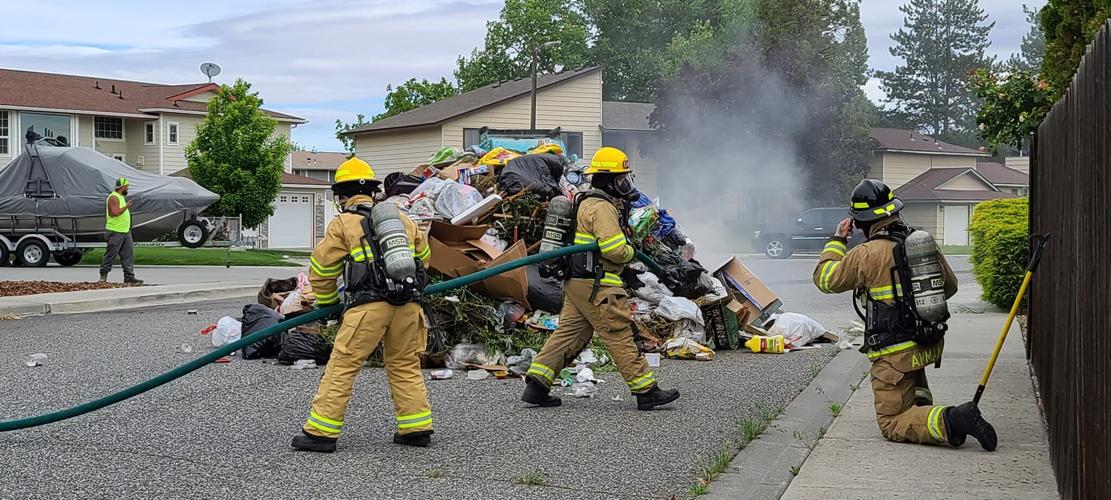 Hot Garbage Benton County firefighters put out flaming trash dumped