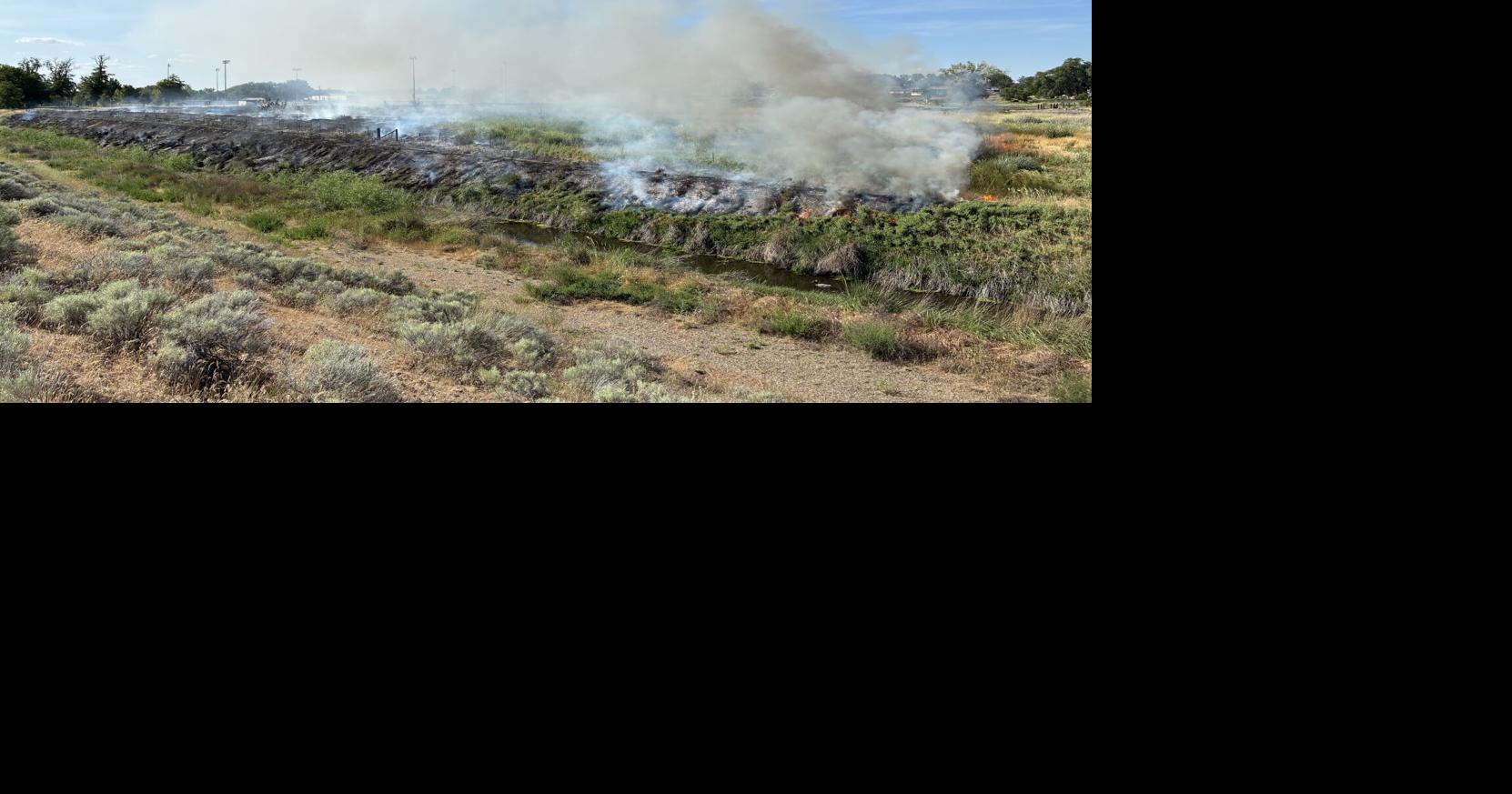 Pasco firefighters contain human-caused brush fire at Riverside Park ...