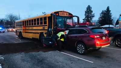 Children unharmed after car collides with school bus in Ellensburg ...