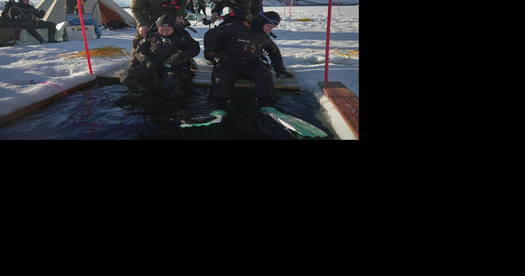 Scientists diving deep below Arctic, Antarctic ice to find its many secrets