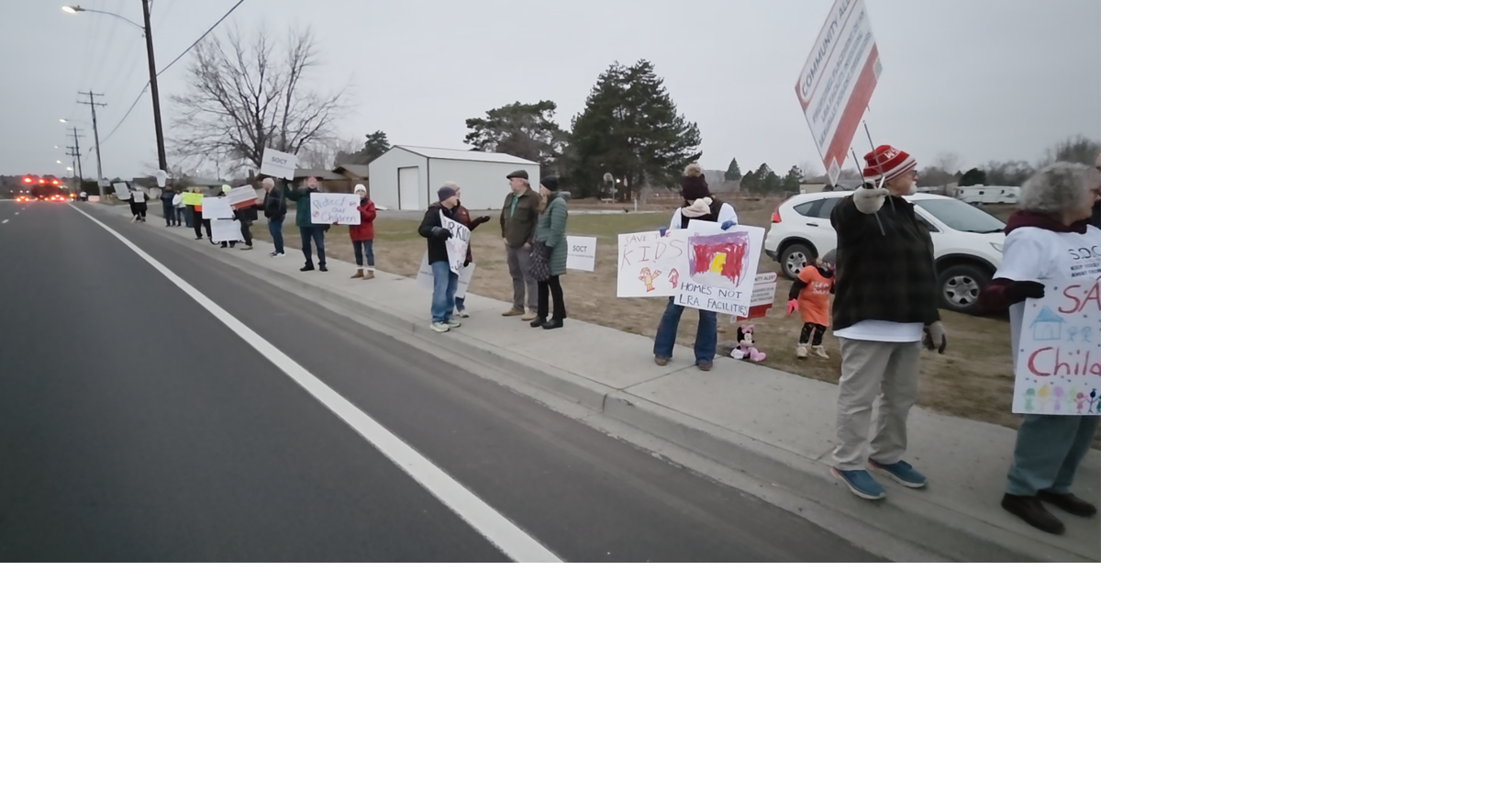 Residents protest as questions surface about loan terms for Kennewick sex offender property