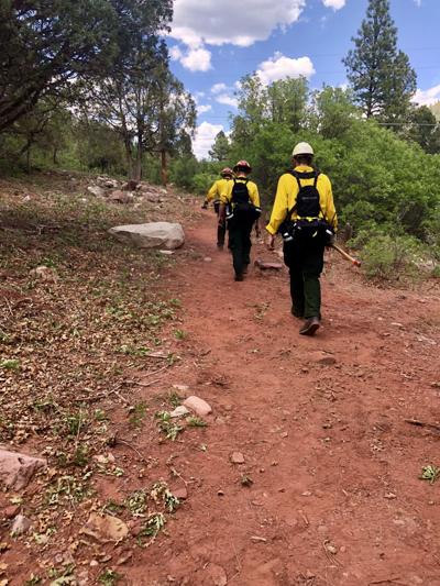 Aspen Firefighters Head South To Provide Aid On Durango Blaze News Aspen Firefighters Adrian Aguilar And Jacob Arywitz Wildland Intern Grant Duta Walk Along A Freshly Cut Fireline Near The 416 Fire Outside Of Durango On