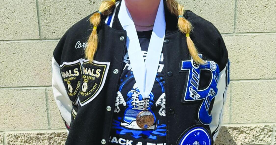 Smith breaks record, wins D4 girls discus title