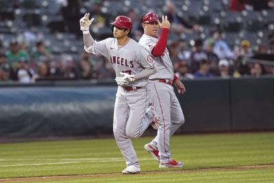 A's split doubleheader with Angels