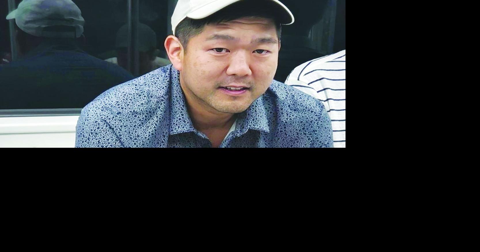 Researcher held at airport, faces deportation