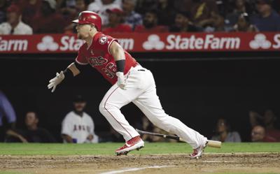 ICYMI: Texas Rangers right fielder Kole Calhoun humorously tries to prevent  reigning MVP Shohei Ohtani from reaching the dugout