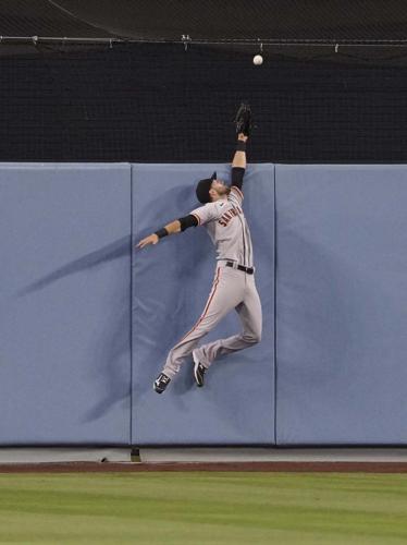 Buehler deals, surging Dodgers sweep Giants with 3-1 victory