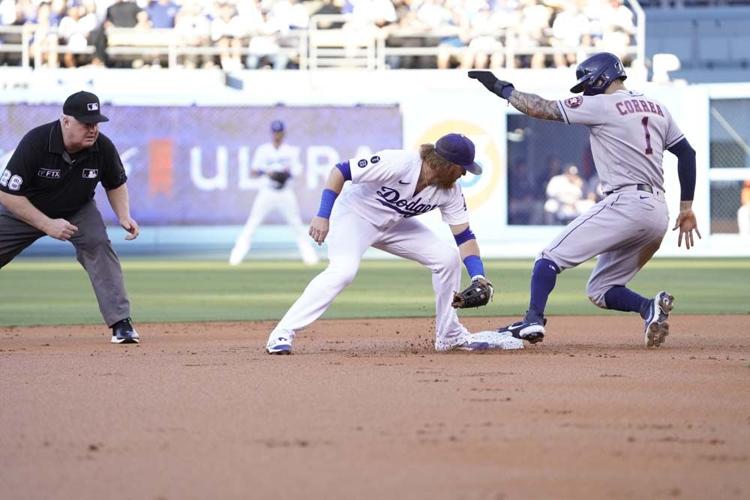 Scherzer Ks 10 in debut, Dodgers hit 4 HRs to beat Astros