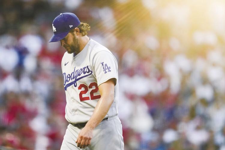 Kershaw deals, and the Dodgers get 2 big breaks in a 2-0 win