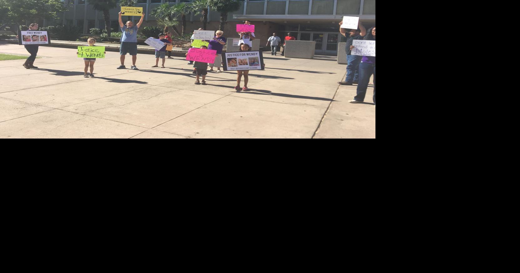 Family, friends of woman accused of murdering her ex-husband protest ...