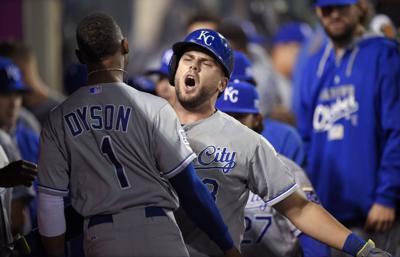 Los Angeles Angels' Mike Moustakas celebrates after hitting a