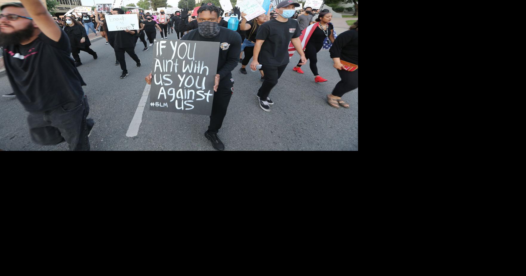 2 arrests made during otherwise peaceful protest Tuesday night in