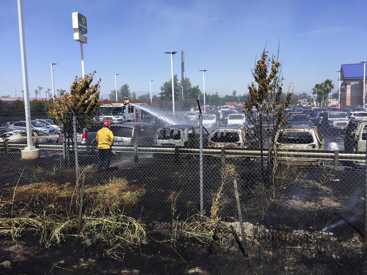 Multiple grass fires cause 86 cars to be either damaged, destroyed at