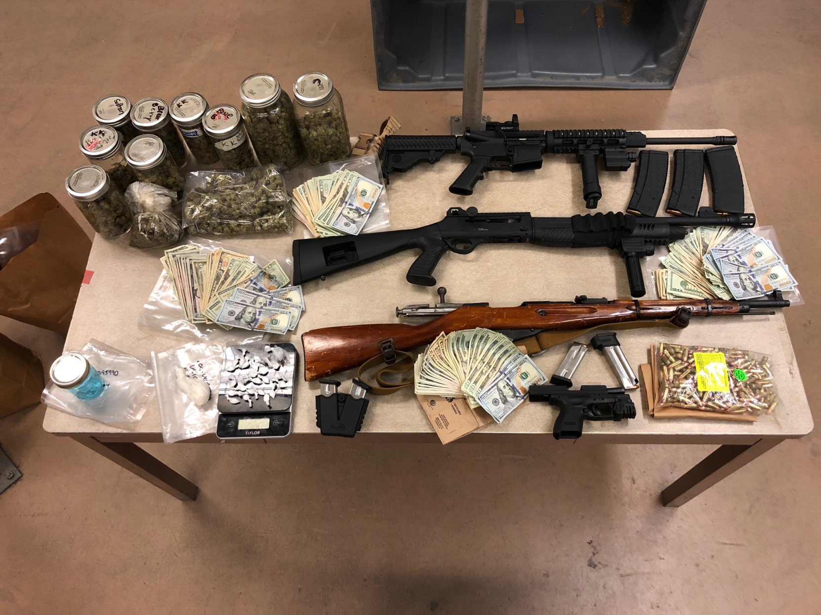 Two Arrested After Drugs, Firearms Found During Search | Breaking ...