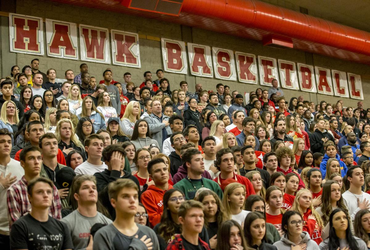 Centennial High Basketball Team Holds Moment Of Silence For Fallen