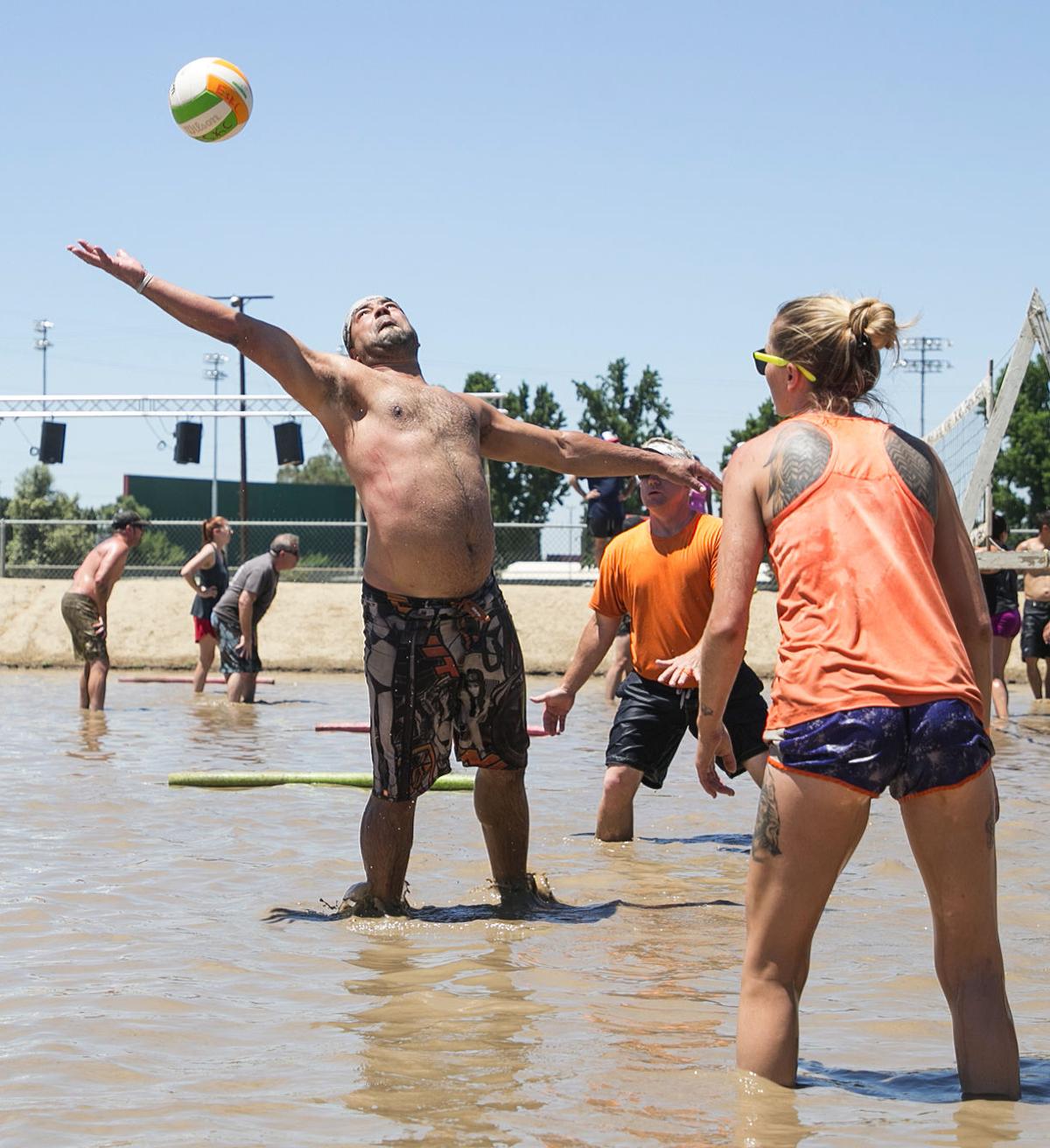 People don't mind getting dirty for Mud Volleyball Tournament News