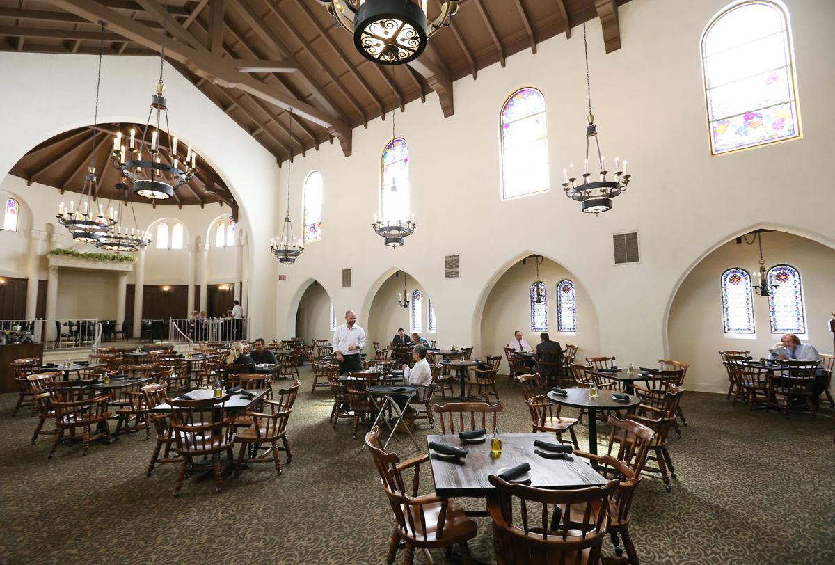 the ivy mediterranean tapas is located in a beautiful old church converted to a restaurant in the 1980s because the former occupant had a members only