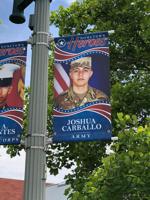 Local families have chance to get faces of active-duty loved ones on downtown banners