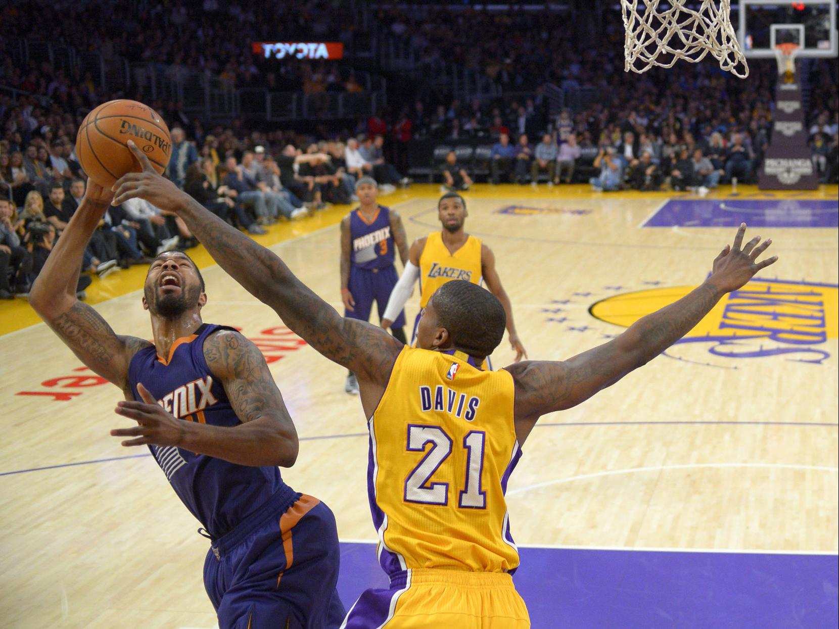 Gerald Green dunks over the Lakers' Jordan Hill