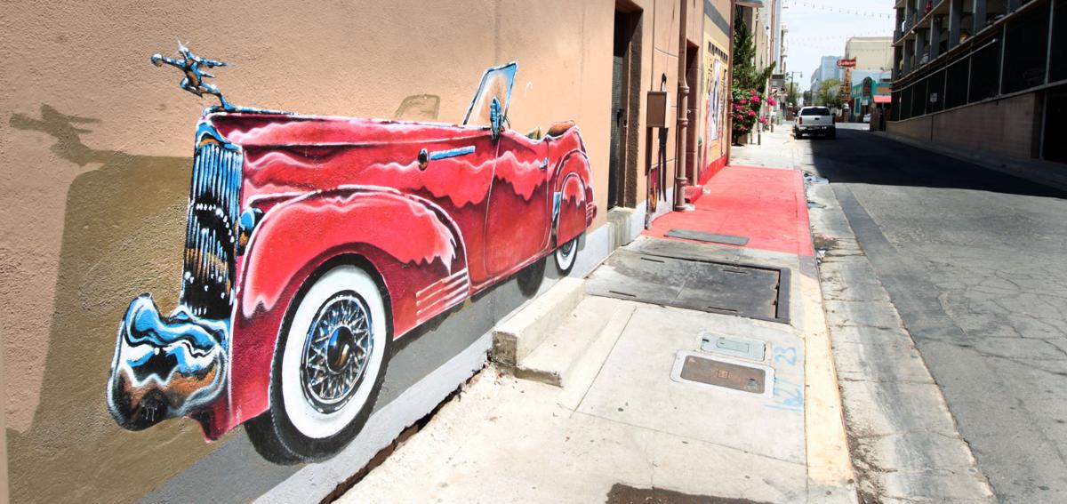 Mural Artist Brightens Downtown Walls Photo Galleries