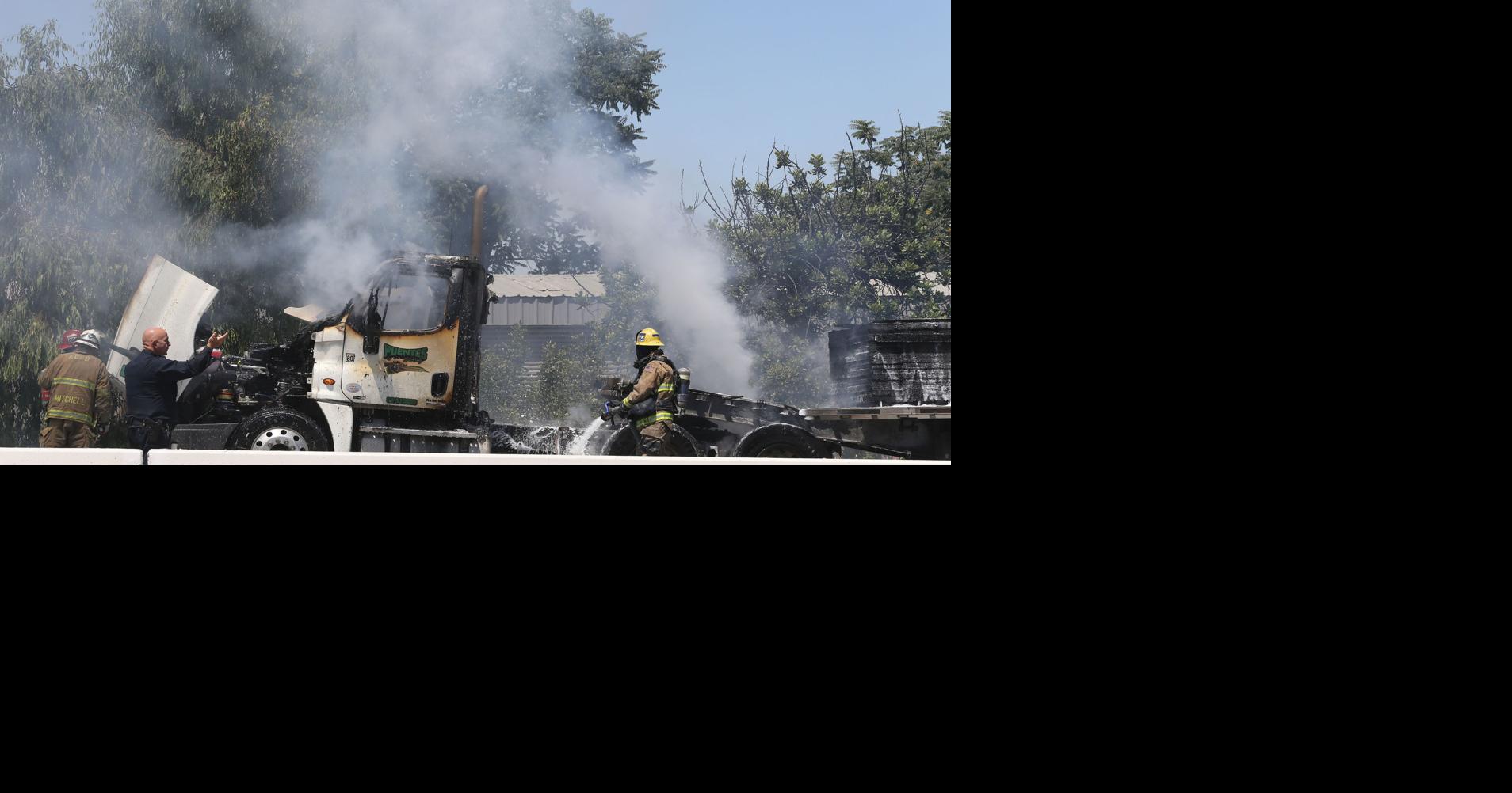 Big rig fire spreads to brush on Highway 99 | News | bakersfield.com