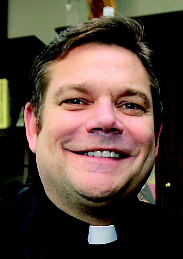 PHOTO GALLERY Monsignor Craig Harrison through the years Photo