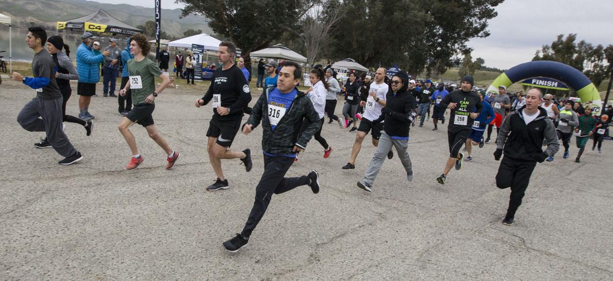 Hundreds brace themselves against a brisk morning for Fog Run News