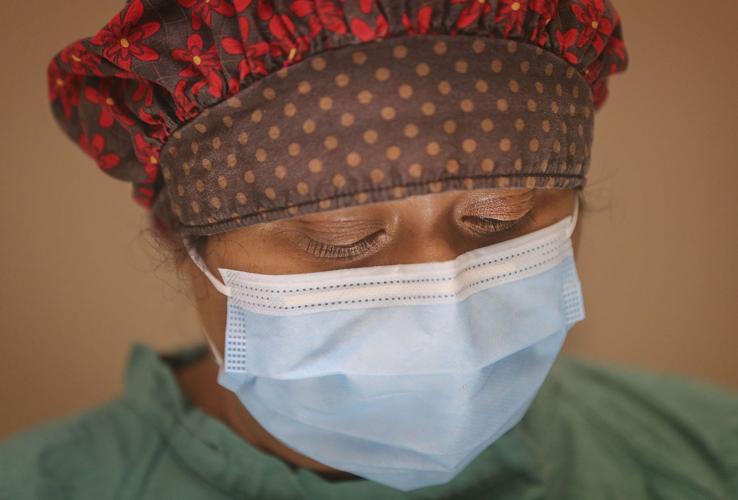 OUR KIND OF PEOPLE Local veterinarian saves animals one pet at a time