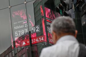 Wall Street rallies to the edge of its all-time high as oil prices ease
