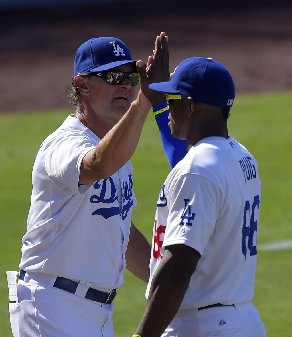 Yasmani Grandal, A.J. Ellis both figure to contribute to Dodgers