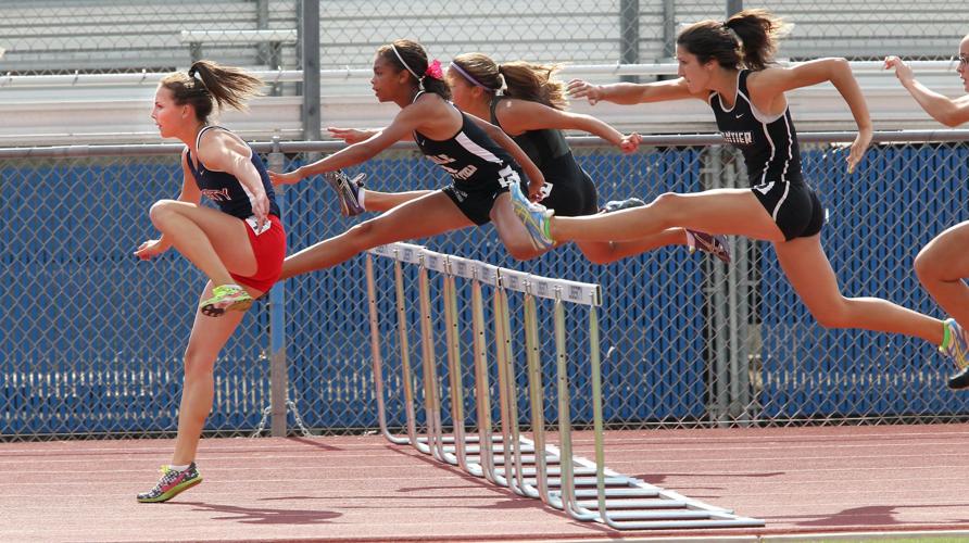 Girls Compete in the 3.000 Meter Steeplechase Editorial Photography - Image  of field, hurdling: 27928382