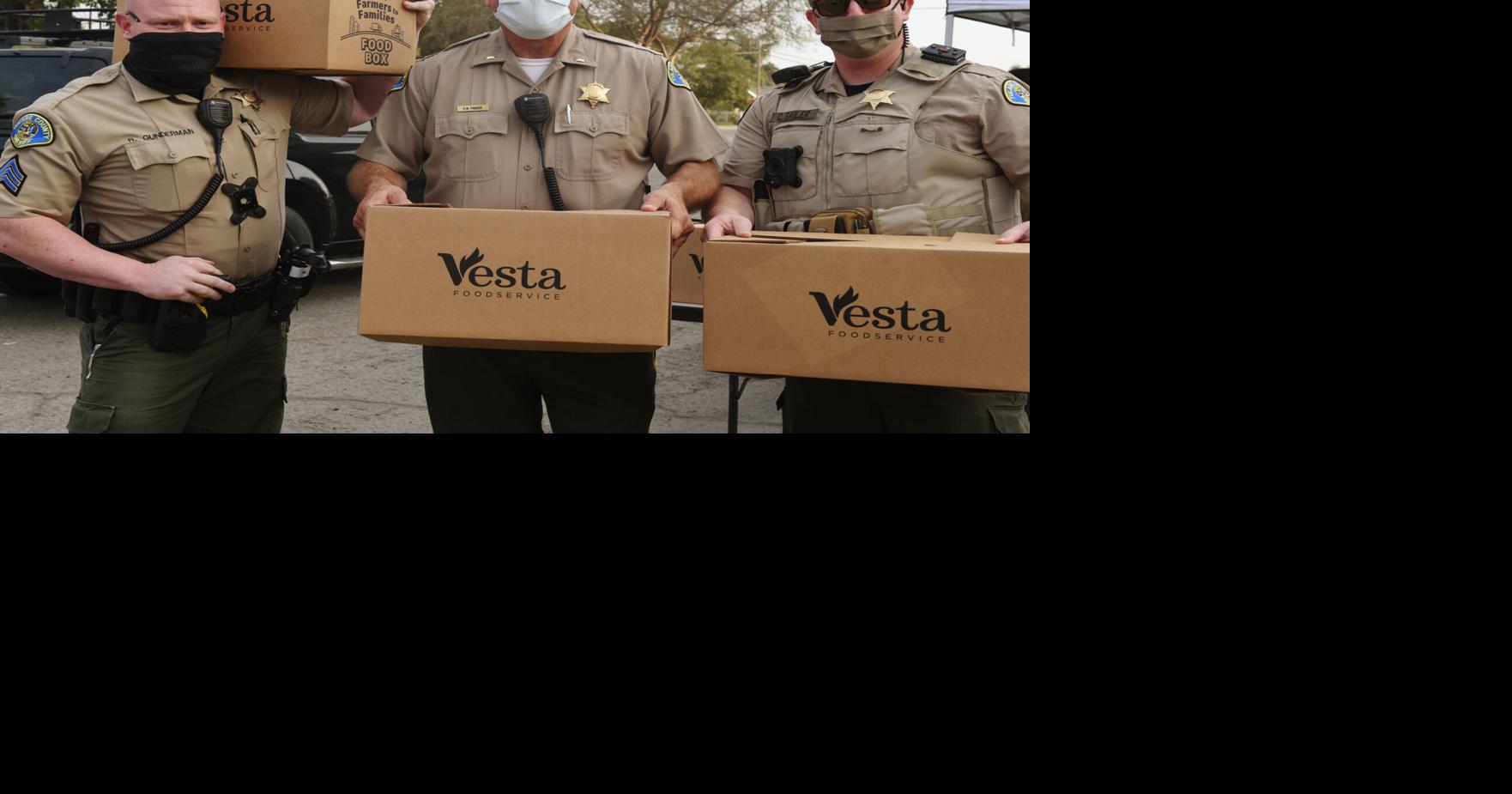 Tulare County deputies hand out masks, food during giveaways in Earlimart, Pixley The Delano