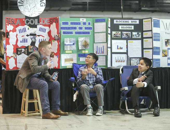 Students hypothesize cell phone radiation, cartoons and ...