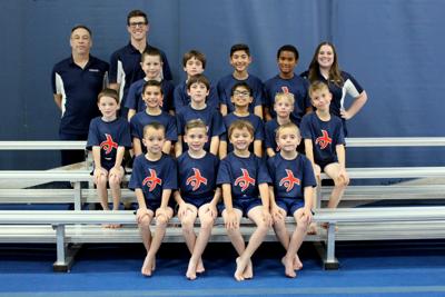 Local boys gymnastics team places second