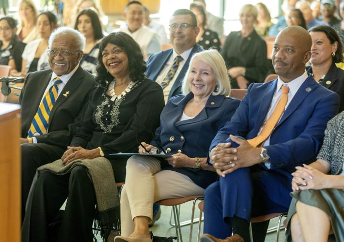 Two former CSUB leaders present their presidential papers to Stiern