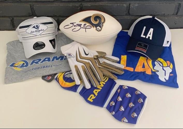 Silent auction features NFL football & business experiences