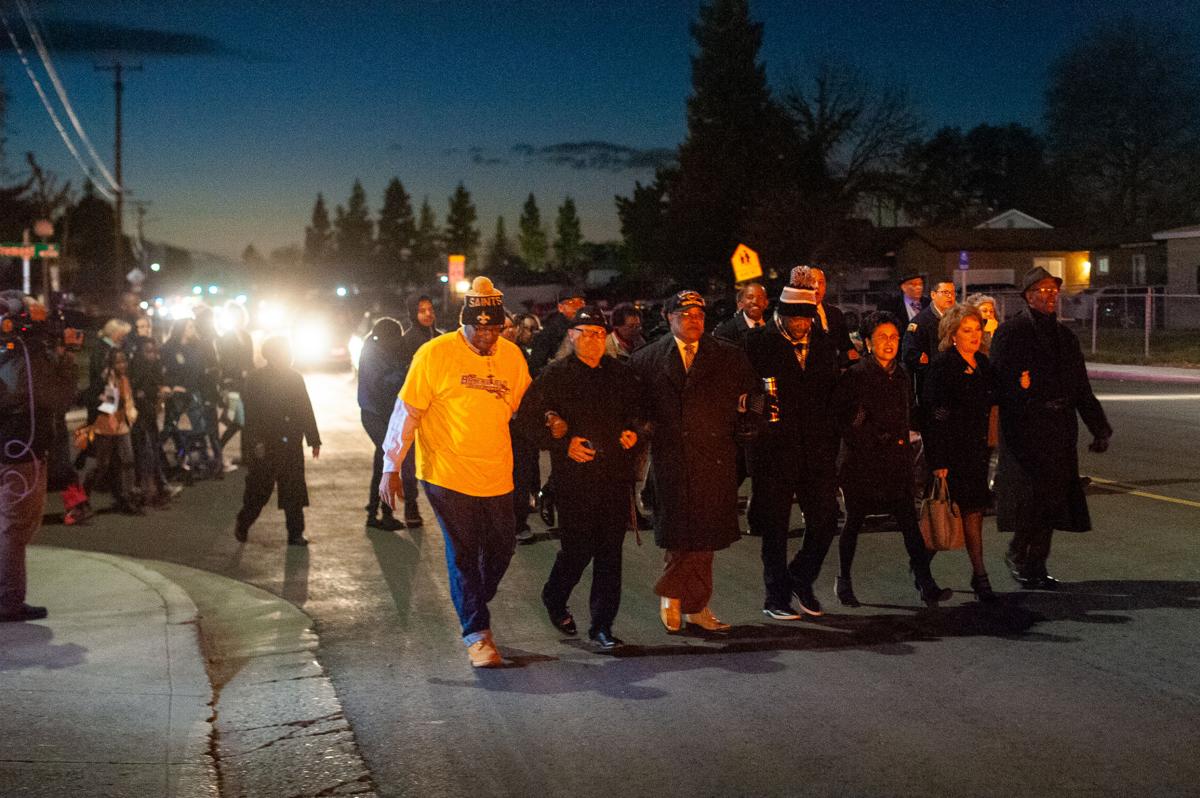 PHOTO GALLERY Dozens march down Wilson Road in south Bakersfield in
