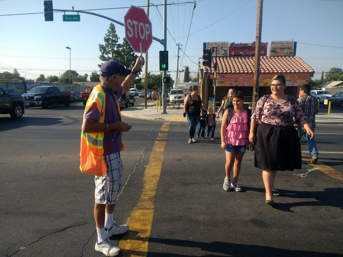 Crossing guard as traffic enforcer