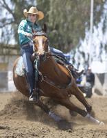 Riders compete at Triple C Ranch Horse Hotel barrel-racing fundraiser