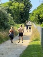 Visitors on trail at Greenbury Point