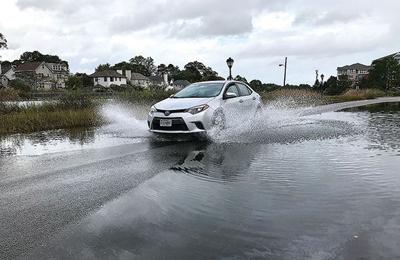 King tide VA car splash