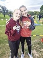 Marquette XC 3rd at Midland; girl individuals in top 10