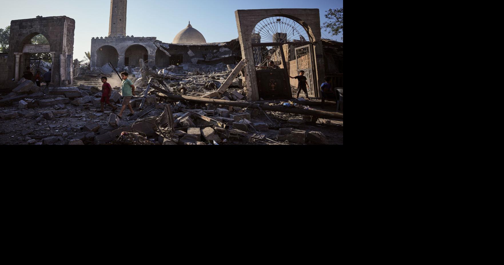 A damaged building collapses in Gaza, killing at least 12 people and other Mideast developments