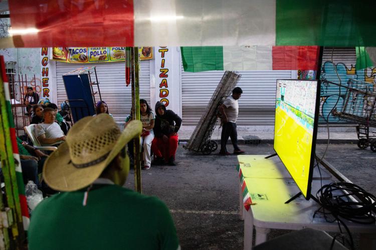 priced-out-of-world-cup-games-mexican-fans-take-celebrations-into