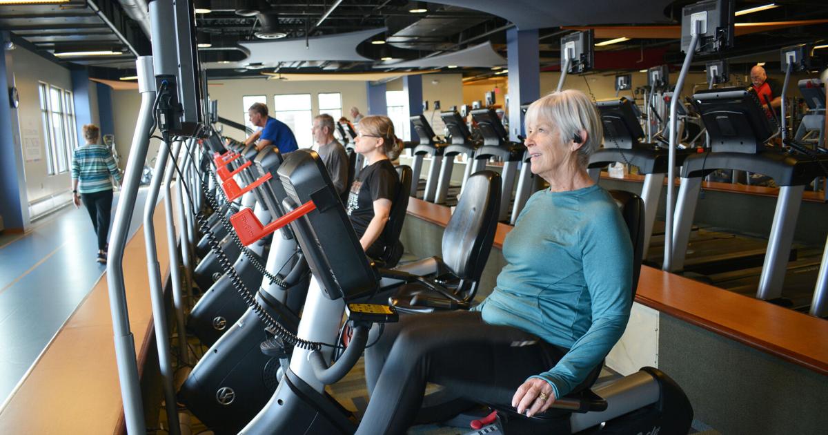 Fitness center members return Fitness center members return