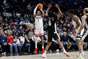 No. 2 UConn improves to 10-0 in Big East after topping Providence behind Reed's late flurry