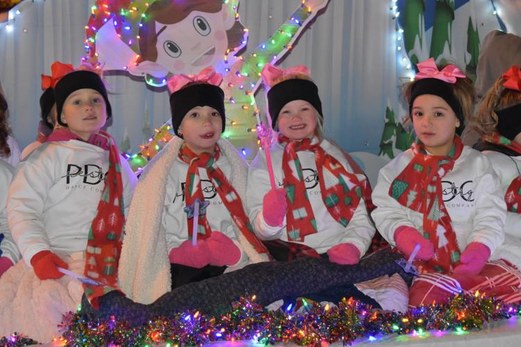 Crowd flocks to Grand Lighted Holiday Parade in Reverse Local News